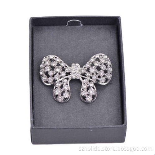 Zinc alloy casting bow-tie crystal broochNew